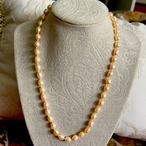 Peachy cram Freshwater pearls  18 in w/ silver lobster clasp. Each Pearl unique